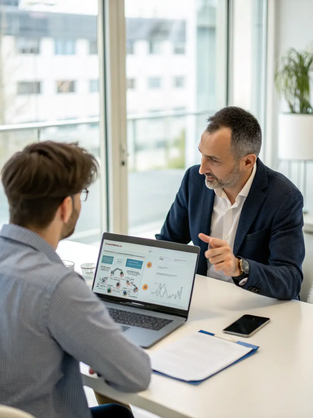 A professional IT consultant advising a client in a modern office setting, discussing technology solutions and strategies.
